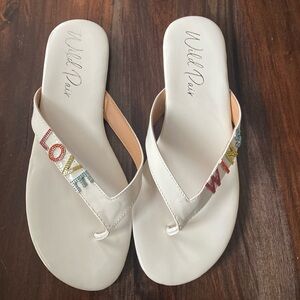 Wild Pair Love Wins flip flops